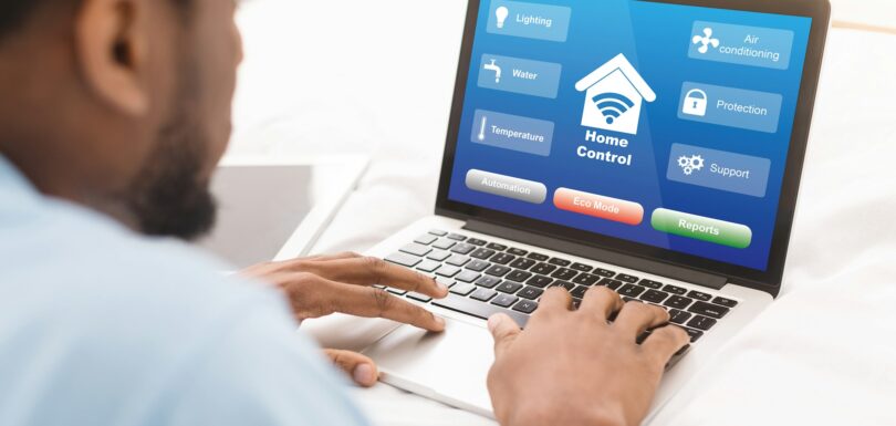 Black Man Using Laptop With Smart Home Control System On Screen, Collage